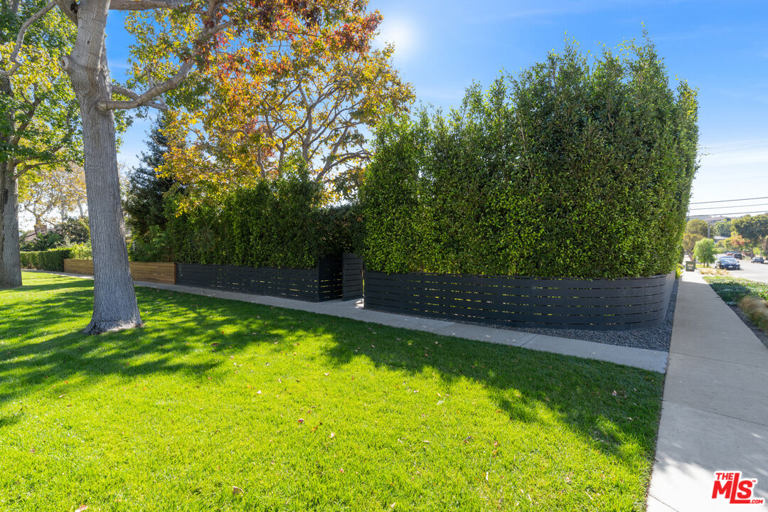 3301 McLaughlin Avenue Los Angeles, CA 90066 - Photo 44 of 46 a view of a swimming pool with a patio