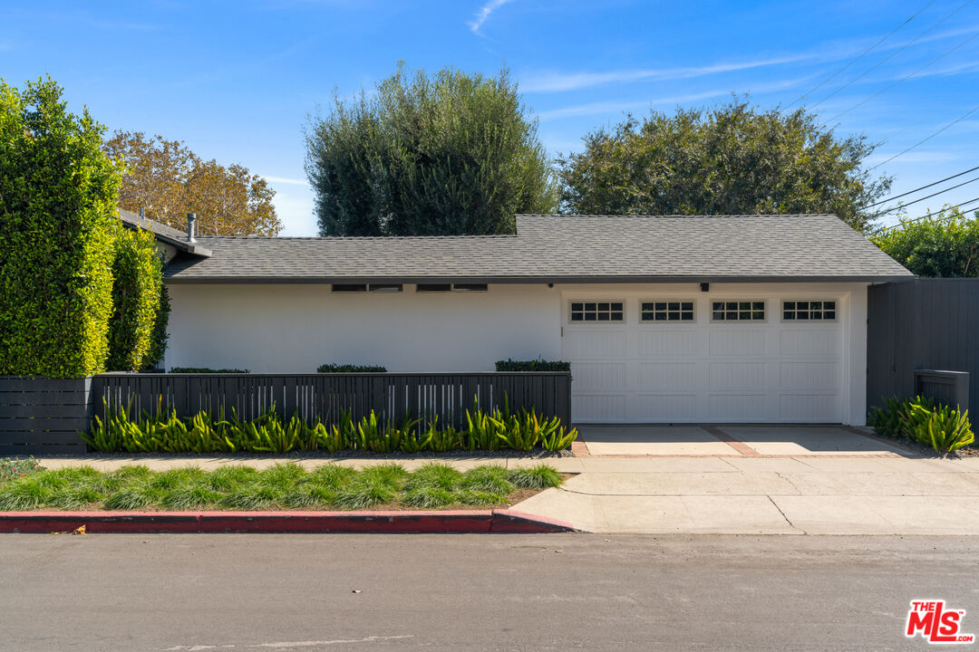 3301 McLaughlin Avenue Los Angeles, CA 90066 - Photo 45 of 46 a front view of a house with a garden