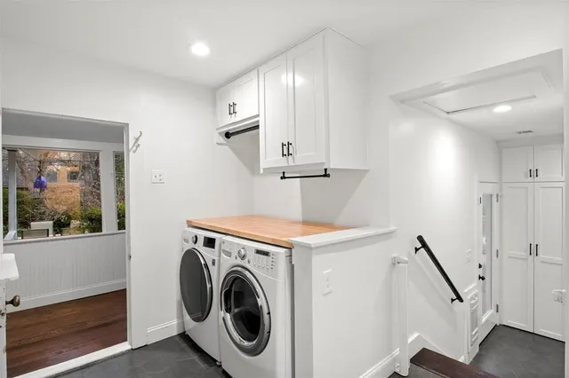 a bathroom with a sink a mirror and a toilet
