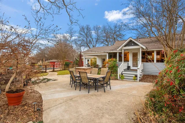a view of a park with swings and slides