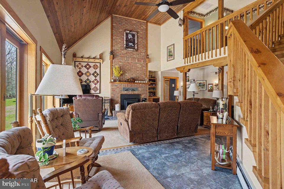 2270 Pine Tree Road Hughesville, PA 17737 - Photo 22 of 90 Cozy living space with rustic charm.