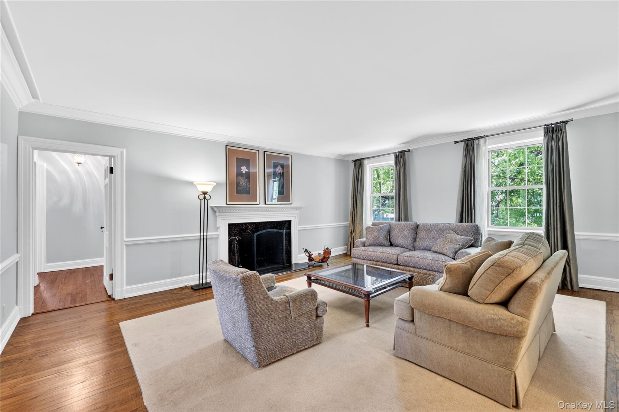 10 Brooklands, Unit 5H Bronxville, NY 10708 - Photo 12 of 33 The Living Room offers generous space with a wood burning fireplace