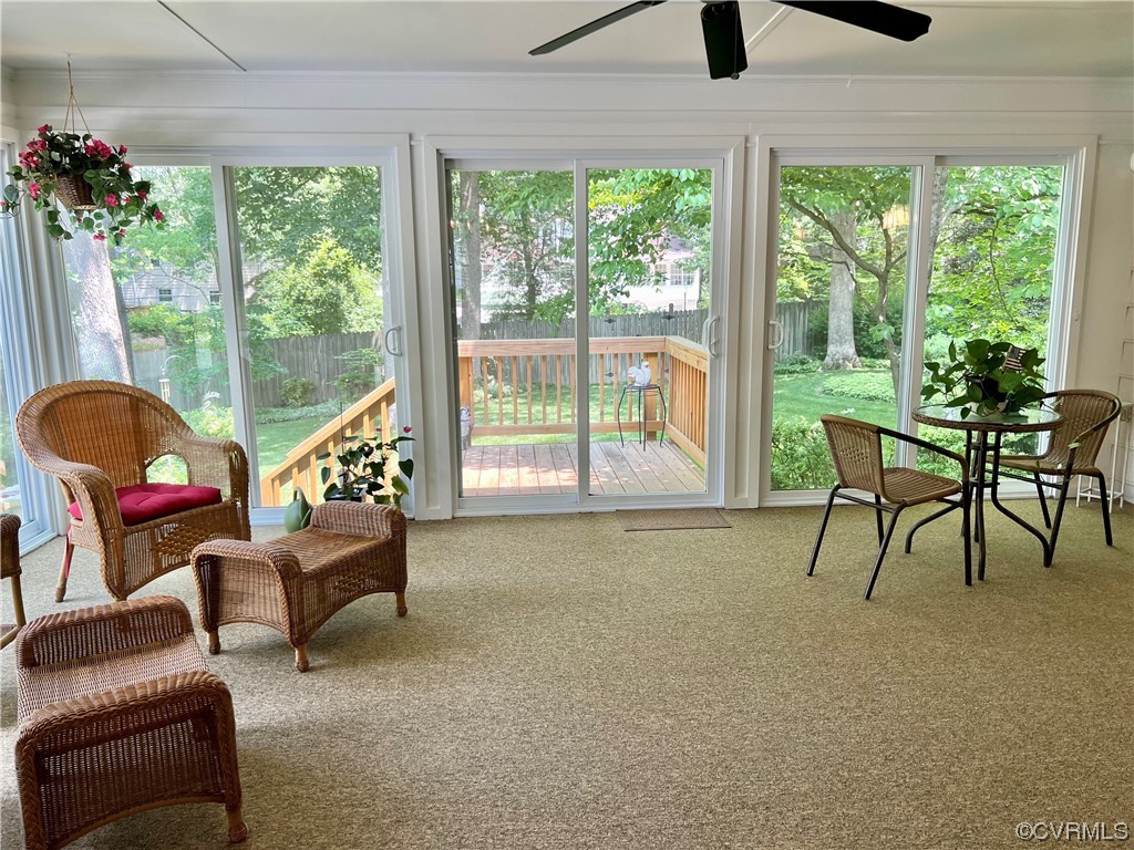 9408 Midvale Road Richmond, VA 23229 - Photo 12 of 24 a living room with furniture and a floor to ceiling window
