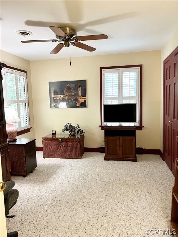 9408 Midvale Road Richmond, VA 23229 - Photo 17 of 24 a living room with furniture a flat screen tv