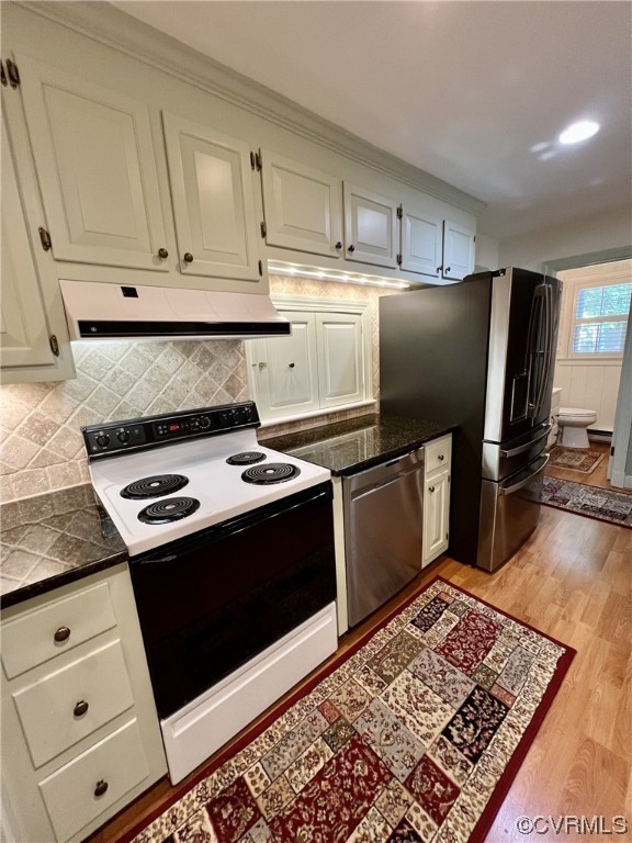 9408 Midvale Road Richmond, VA 23229 - Photo 8 of 24 a kitchen with stainless steel appliances granite countertop a refrigerator stove and sink