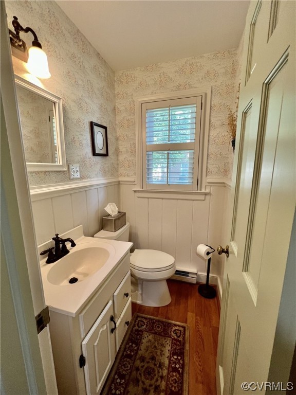 9408 Midvale Road Richmond, VA 23229 - Photo 9 of 24 a bathroom with a sink toilet and mirror