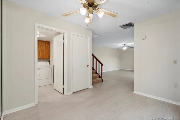 a bathroom with a sink a toilet and vanity
