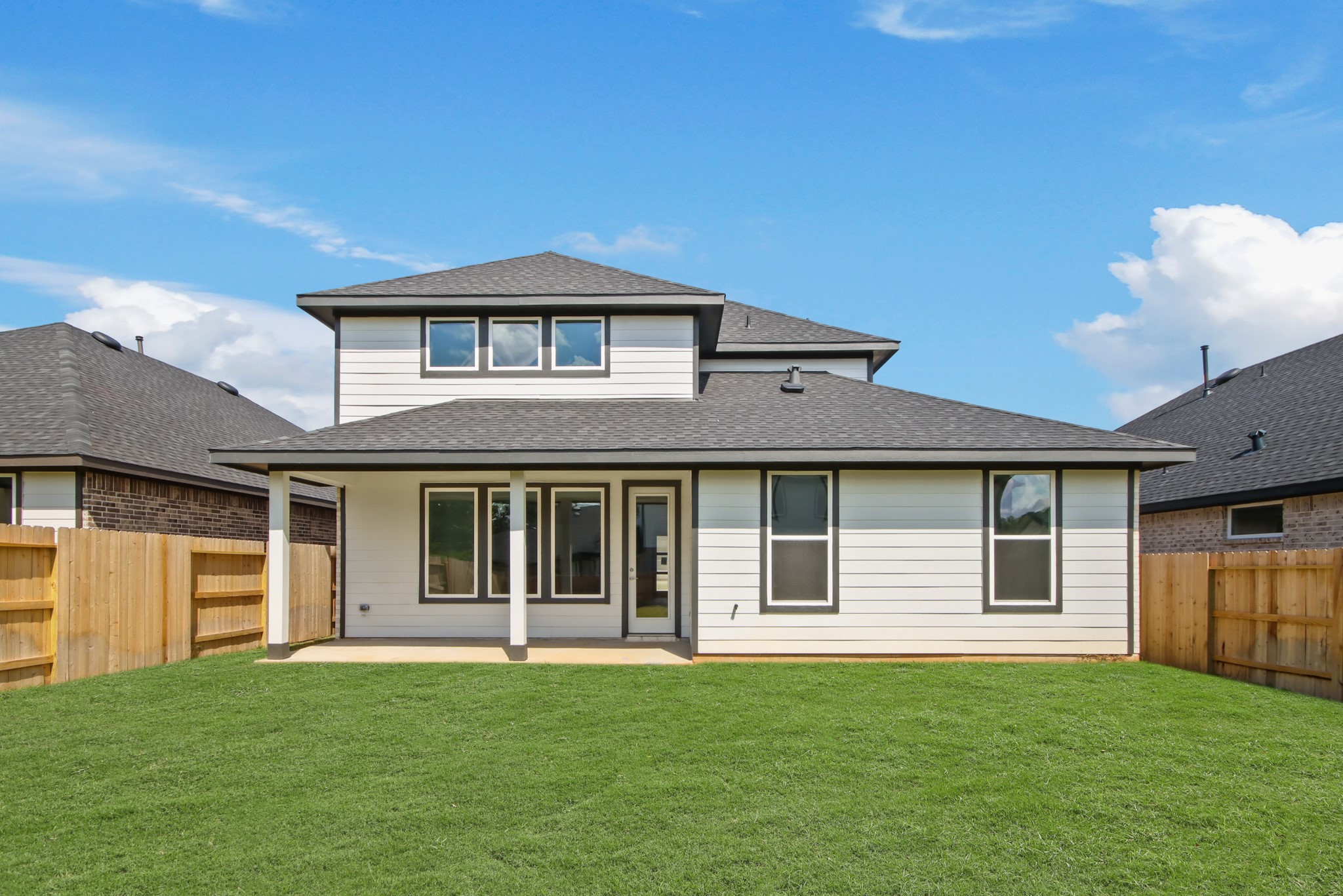 251 Springfield Terrace Drive Conroe, TX 77304 - Photo 14 of 23 a front view of a house with a yard