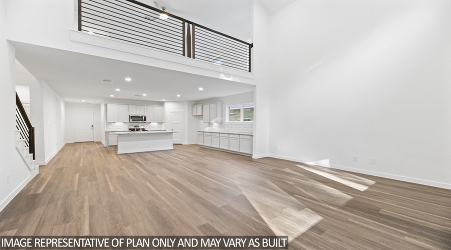 251 Springfield Terrace Drive Conroe, TX 77304 - Photo 7 of 23 a view of kitchen with refrigerator and window