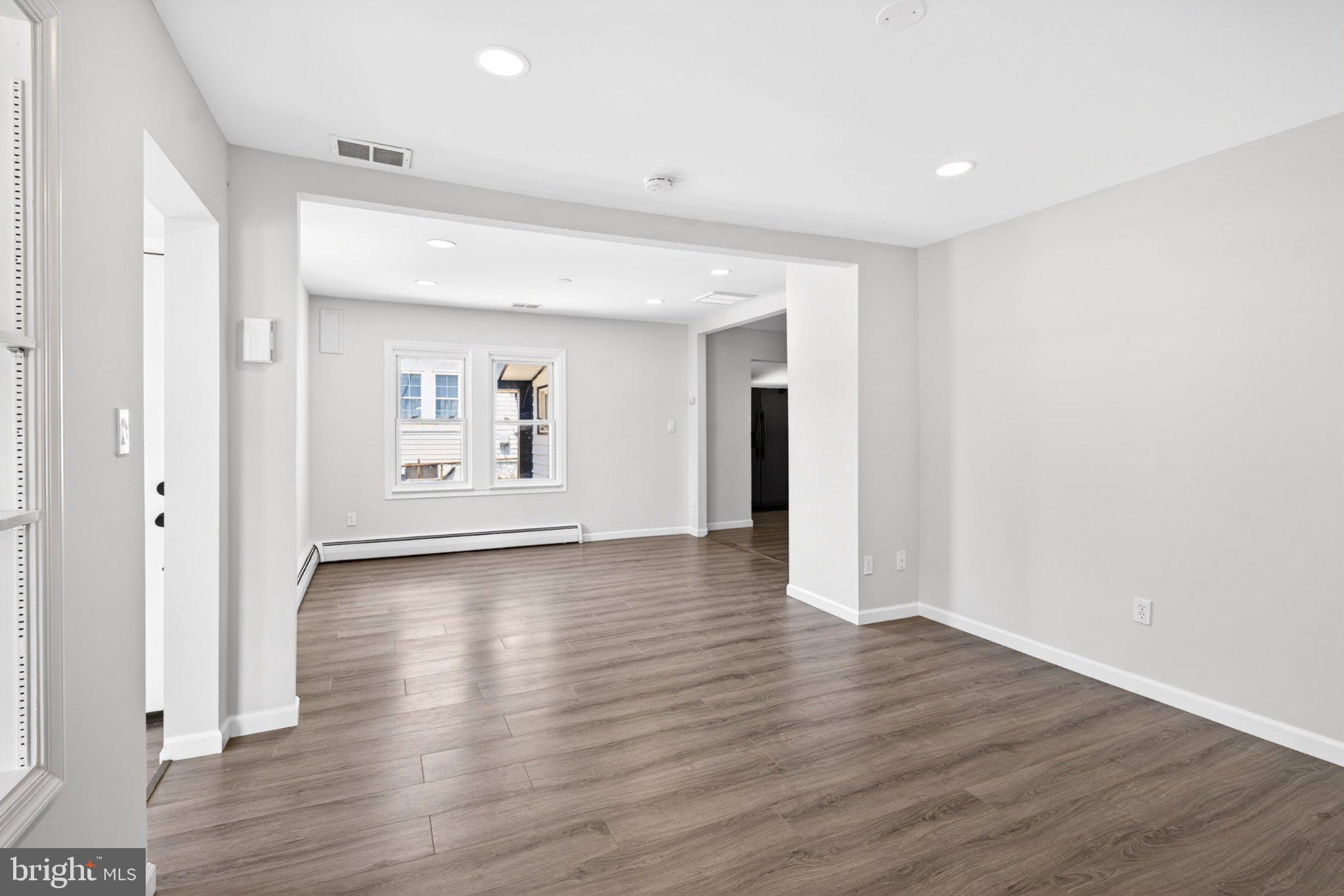 9081 Dumhart Road Laurel, MD 20723 - Photo 16 of 45 Spacious, light-filled living area.