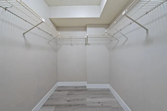 a view of a room with racks on the wall