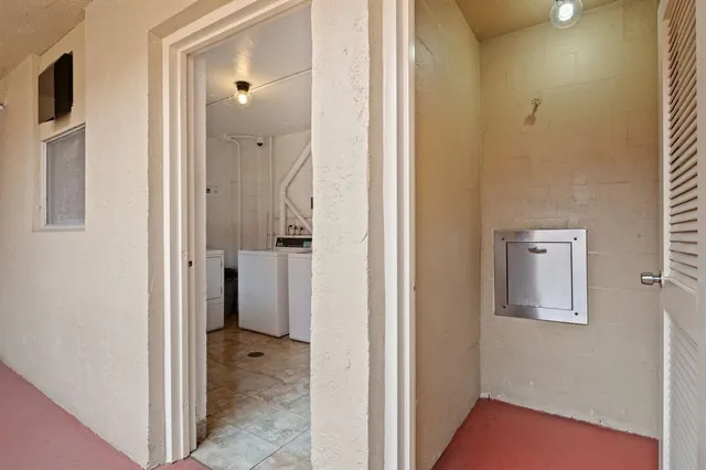 a view of a bathroom with toilet