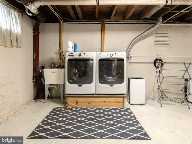 a utility room with a washer and dryer