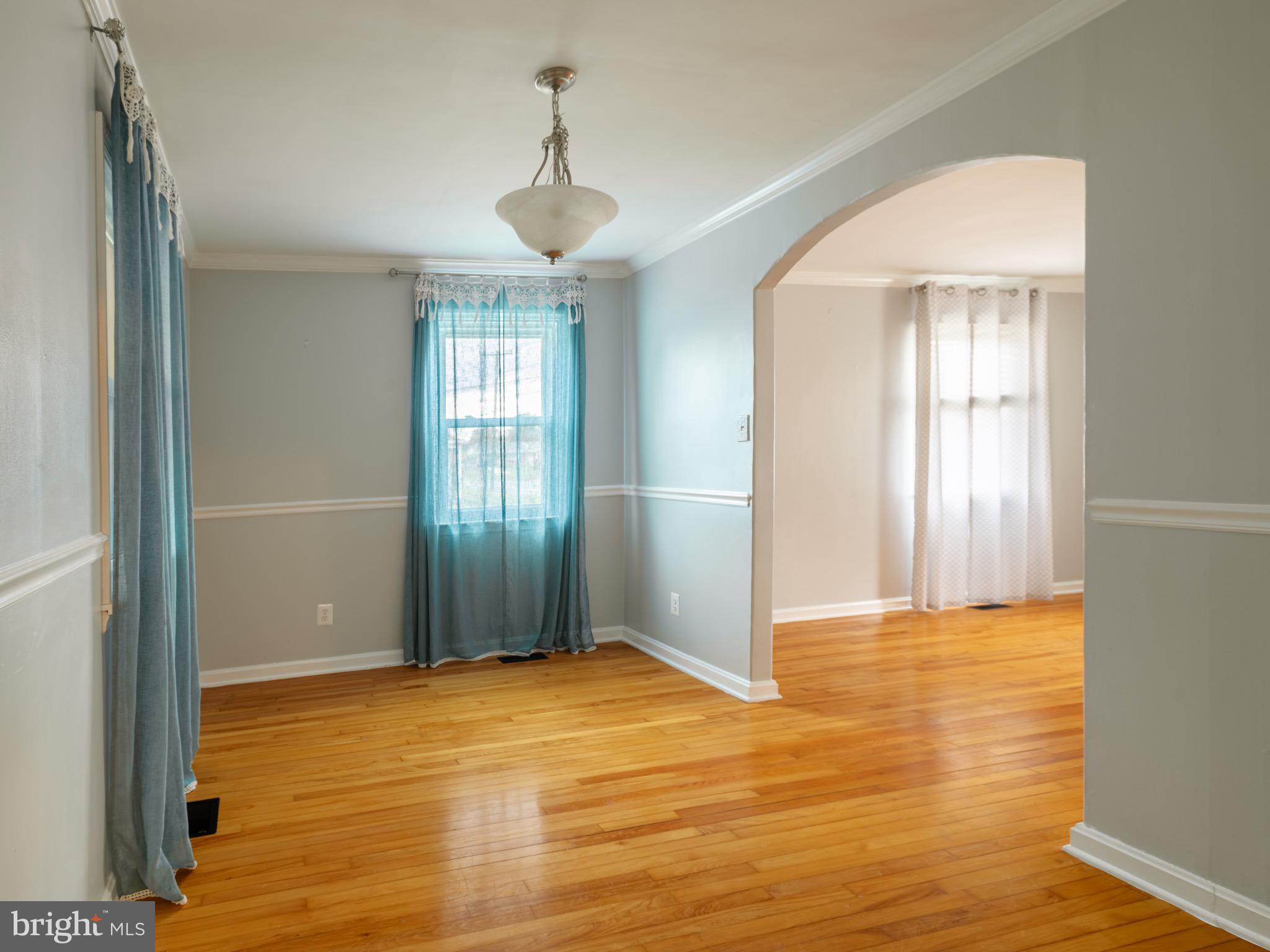 16 Norva Avenue Frederick, MD 21701 - Photo 6 of 15 a view of livingroom with hardwood floor and window