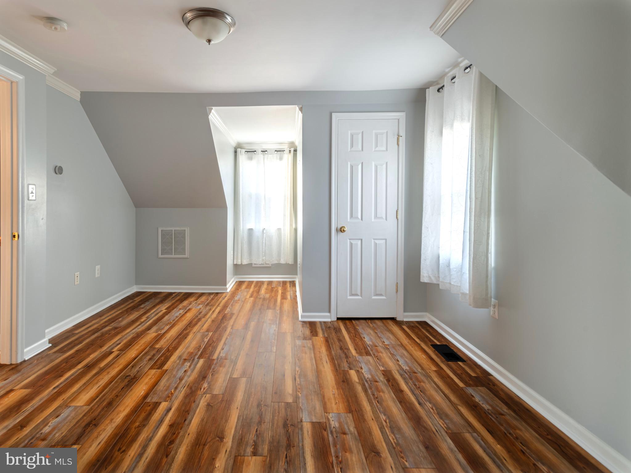16 Norva Avenue Frederick, MD 21701 - Photo 10 of 15 a view of a room with wooden floor and window