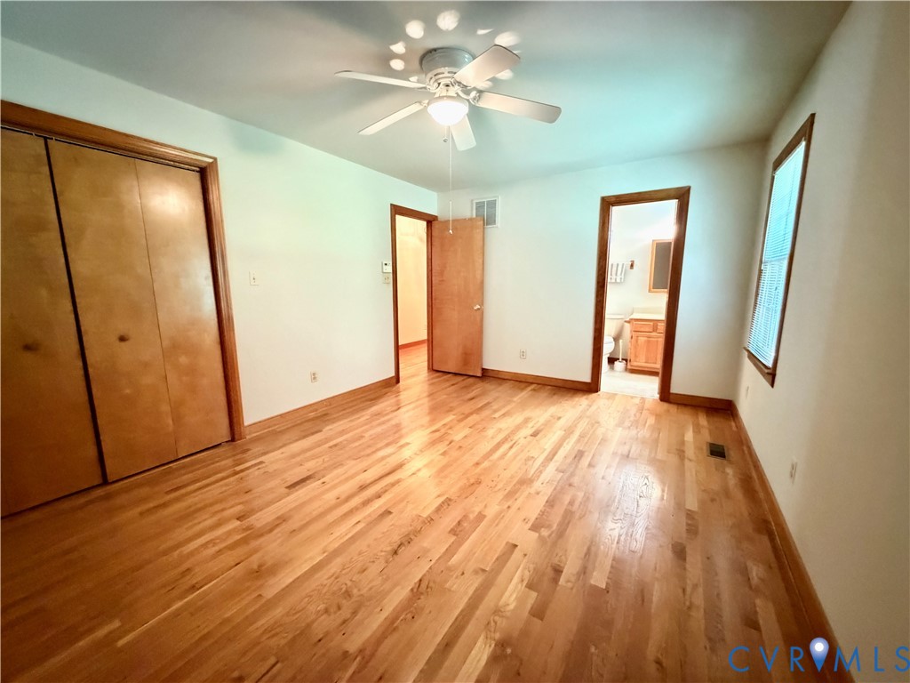 3933 Dunraven Road North Chesterfield, VA 23236 - Photo 30 of 30 a view of livingroom with hardwood floor and a ceiling fan