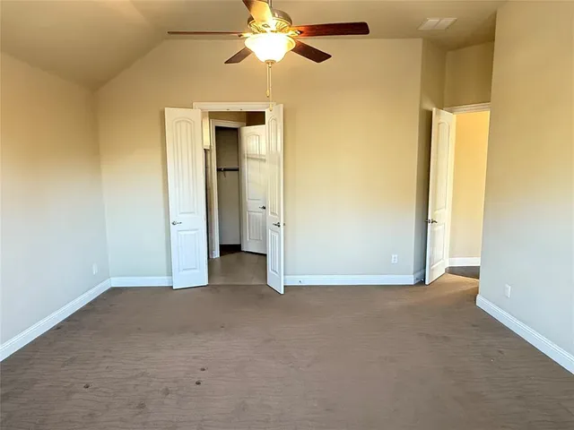 a bathroom with a shower and a sink