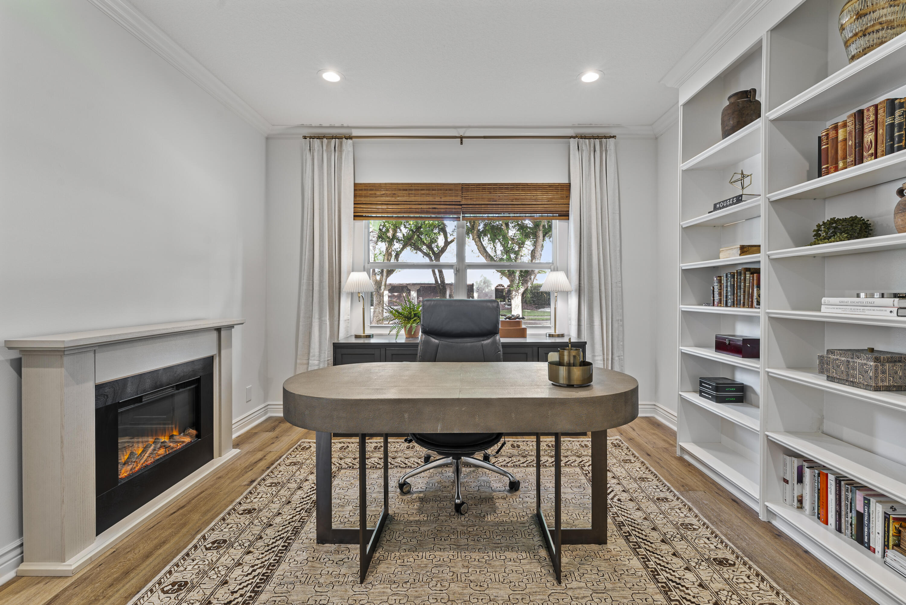 1925 Parkside Circle South Boca Raton, FL 33486 - Photo 15 of 61 a dining room with furniture and a fireplace