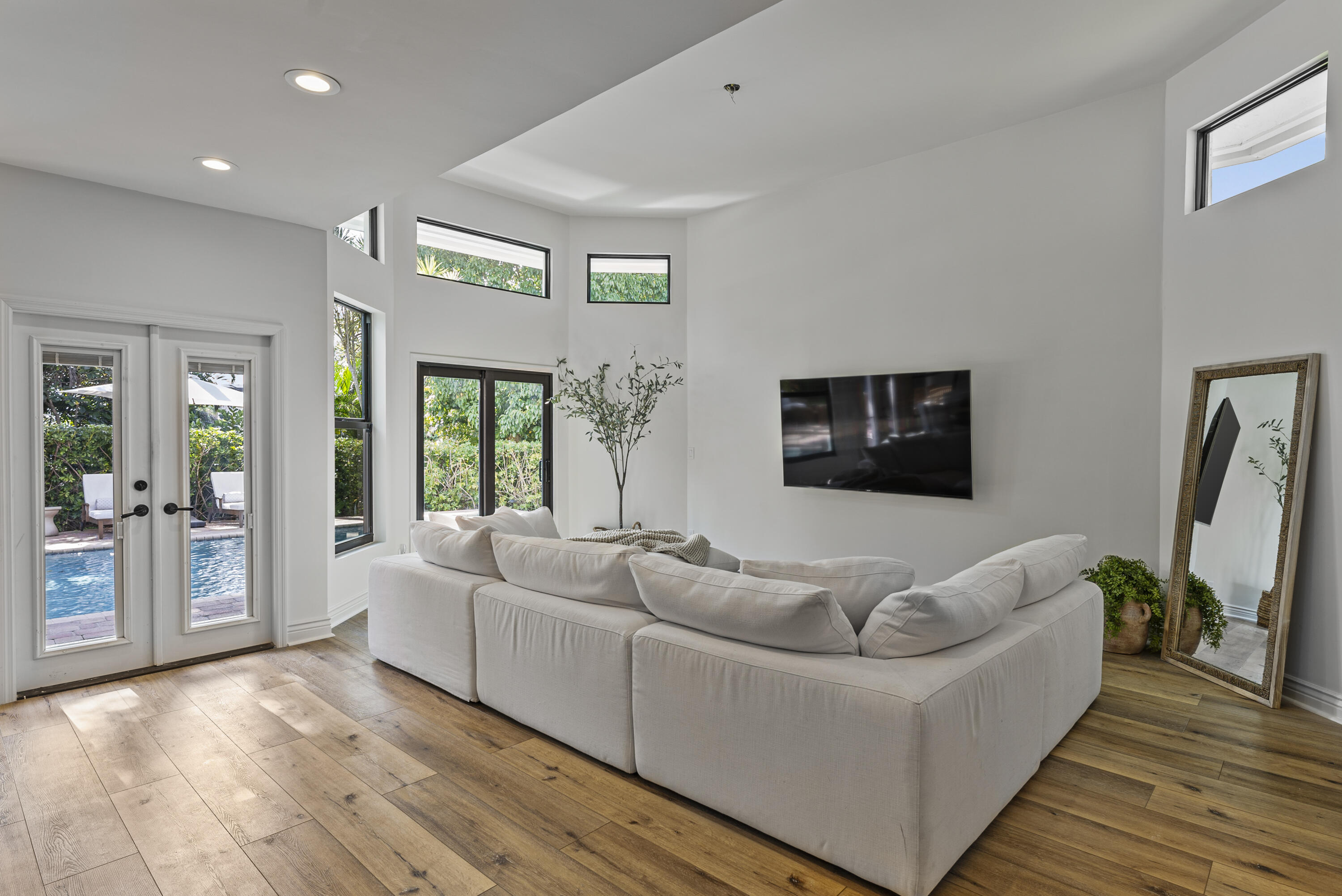 1925 Parkside Circle South Boca Raton, FL 33486 - Photo 24 of 61 a living room with furniture and a flat screen tv