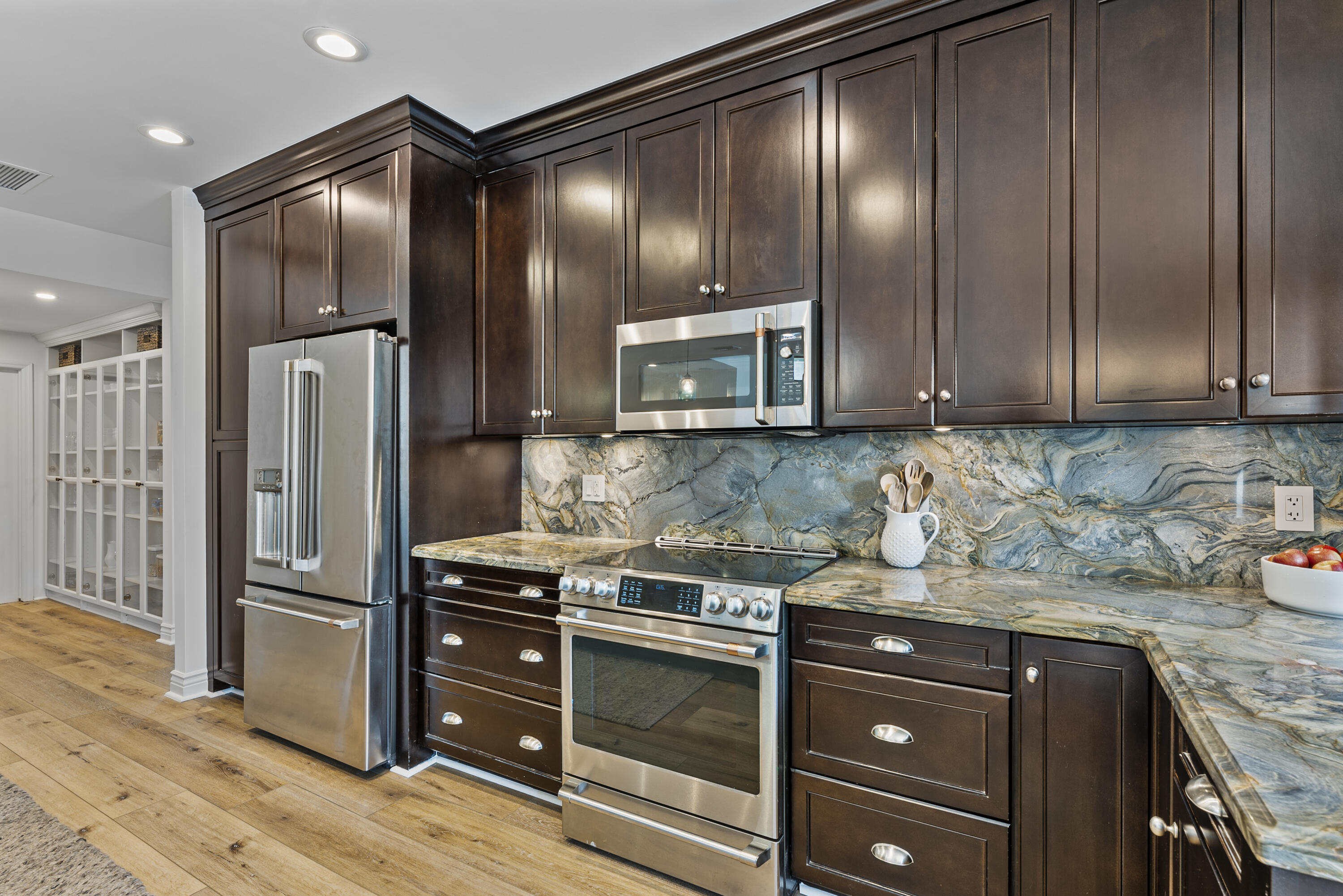 1925 Parkside Circle South Boca Raton, FL 33486 - Photo 28 of 61 a kitchen with granite countertop stainless steel appliances and refrigerator