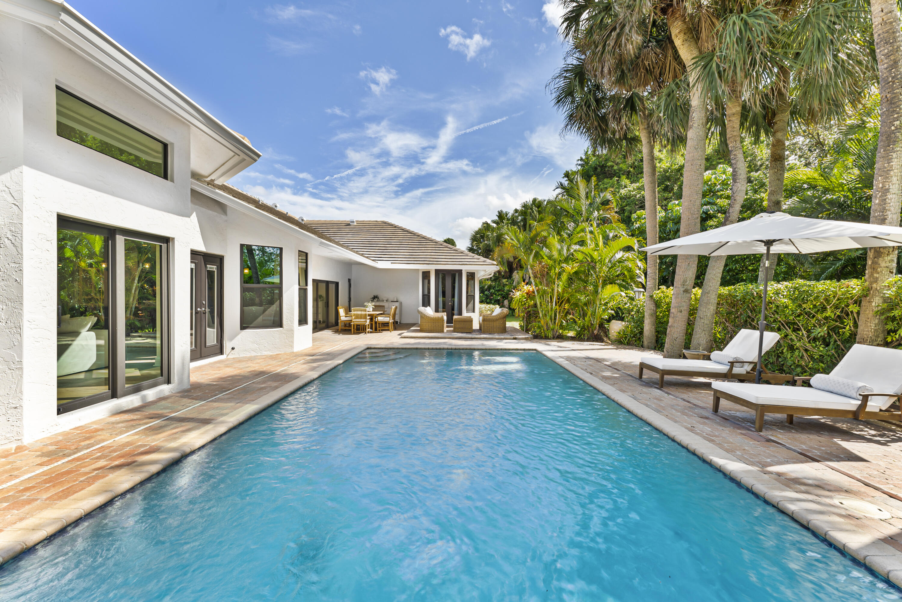 1925 Parkside Circle South Boca Raton, FL 33486 - Photo 4 of 61 a view of a house with backyard and sitting area
