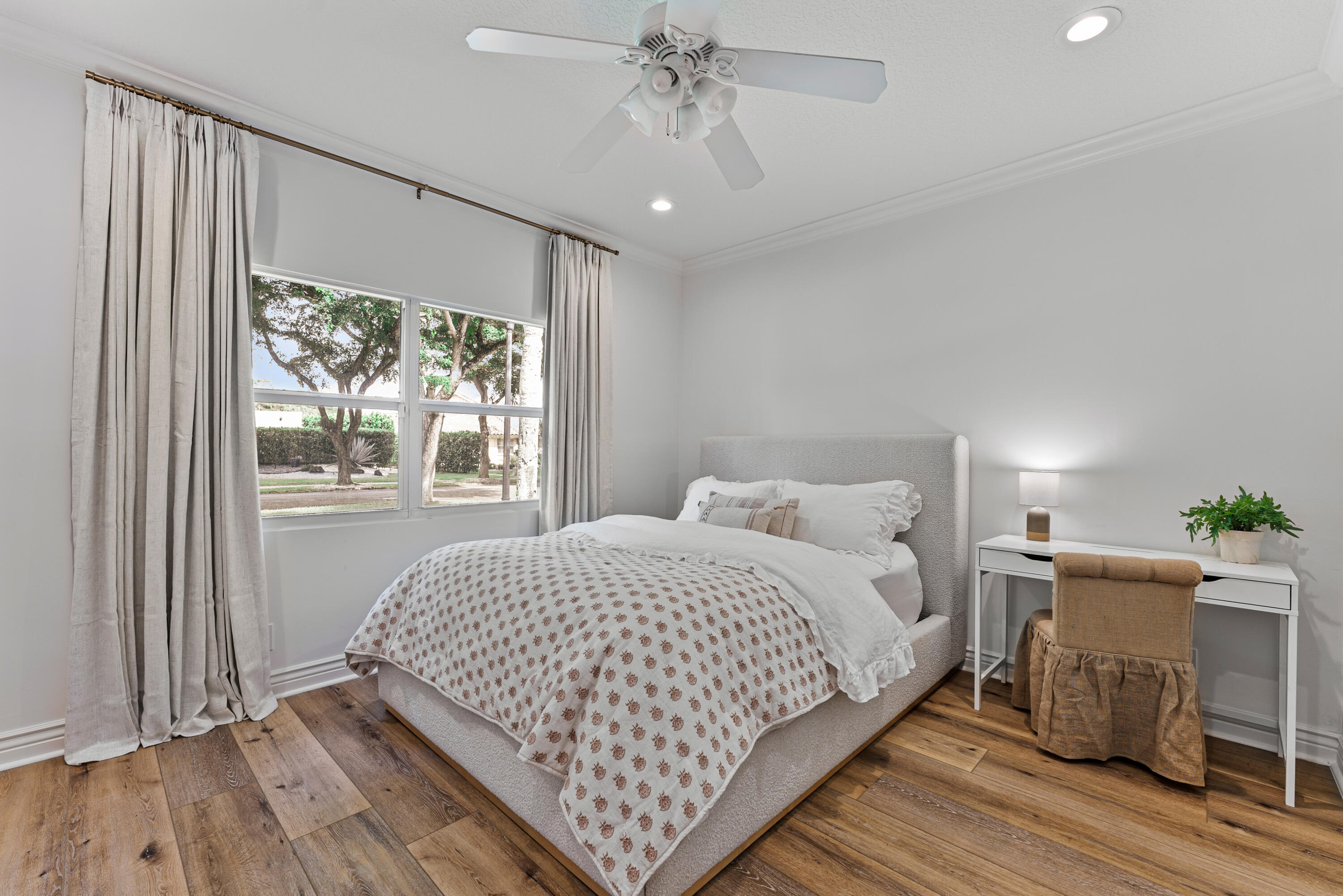 1925 Parkside Circle South Boca Raton, FL 33486 - Photo 41 of 61 a bedroom with a large bed and a window