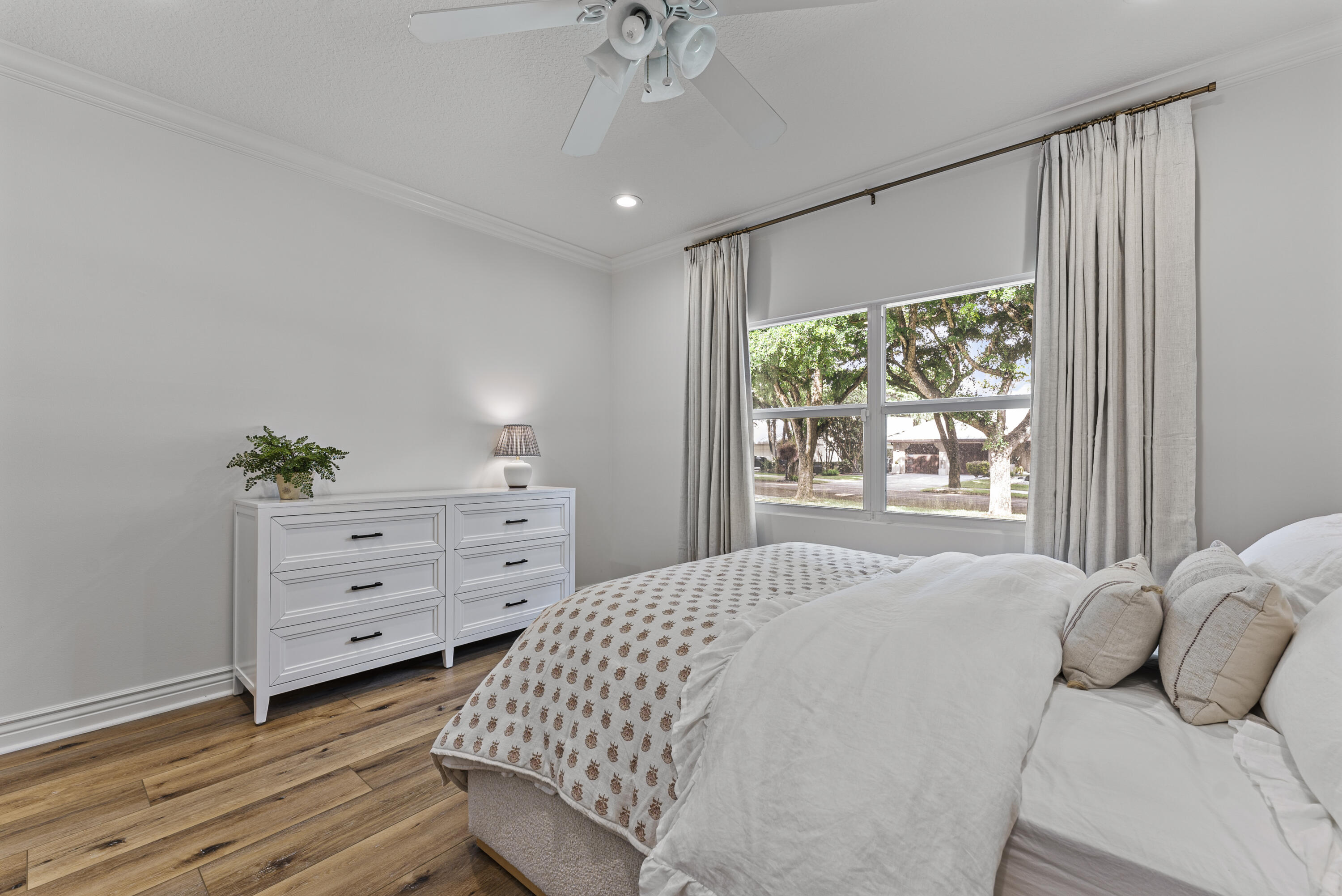 1925 Parkside Circle South Boca Raton, FL 33486 - Photo 42 of 61 a bedroom with a bed and a window