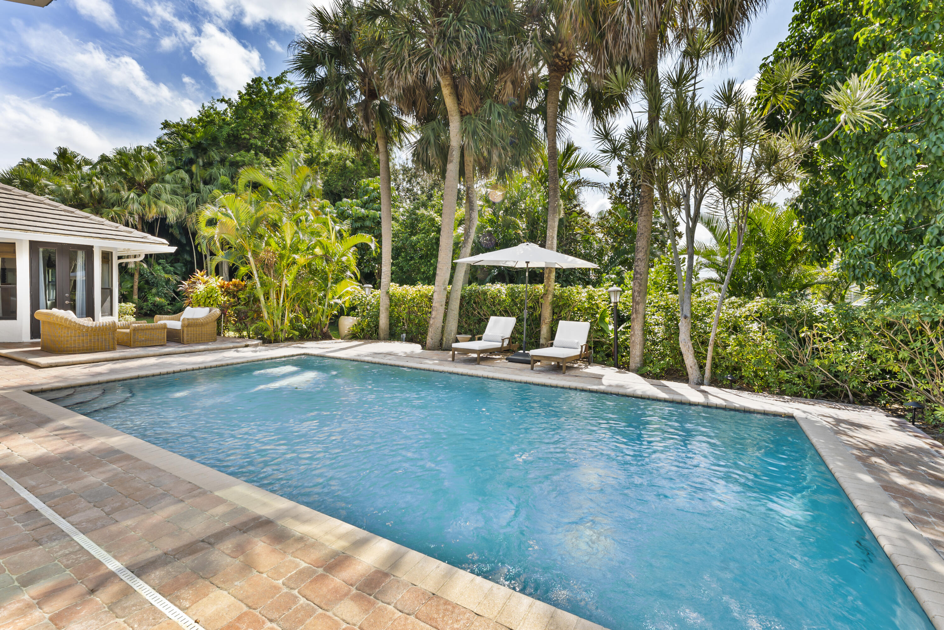 1925 Parkside Circle South Boca Raton, FL 33486 - Photo 46 of 61 a view of a swimming pool with a patio