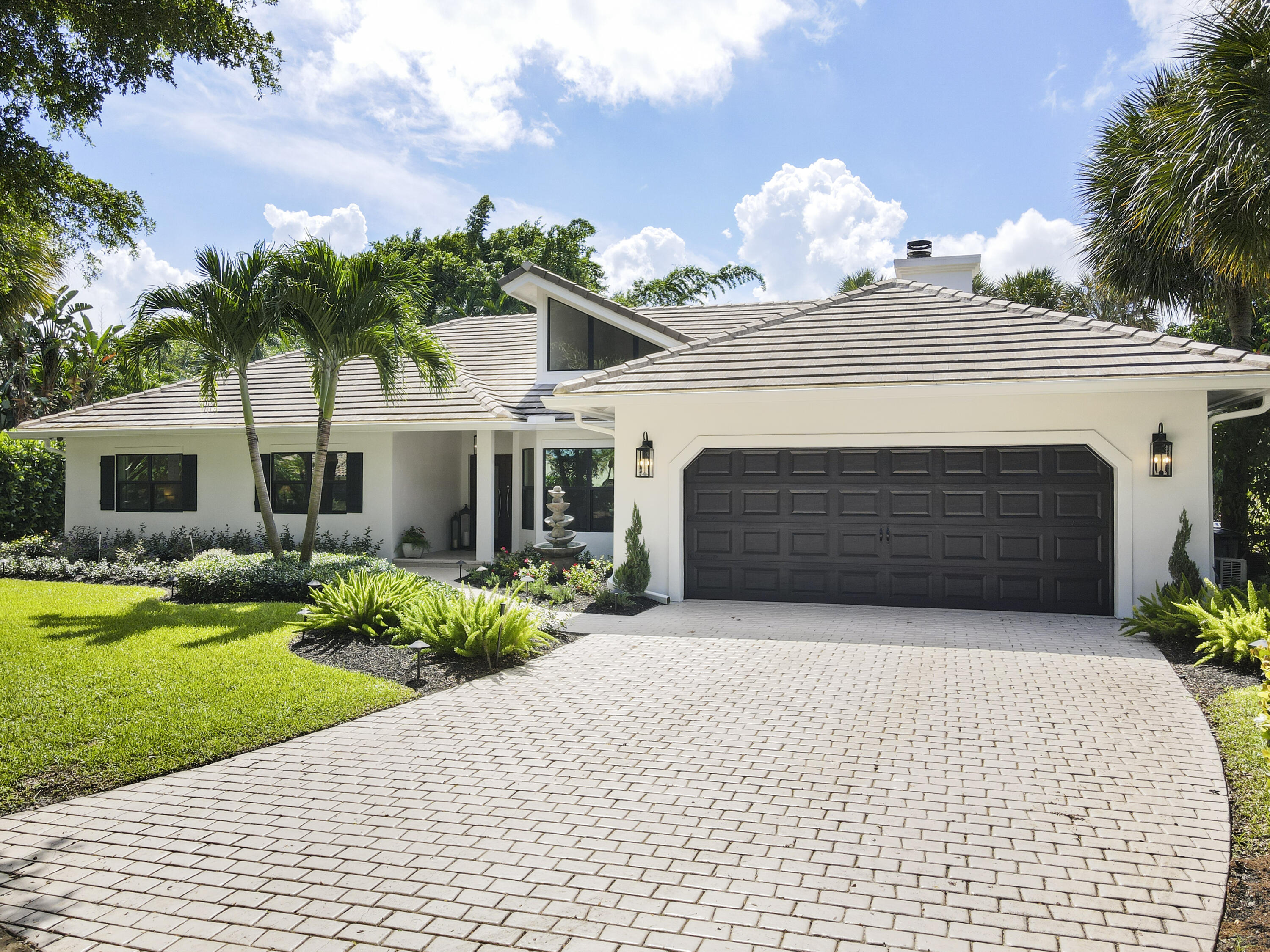 1925 Parkside Circle South Boca Raton, FL 33486 - Photo 61 of 61 a front view of a house with garden