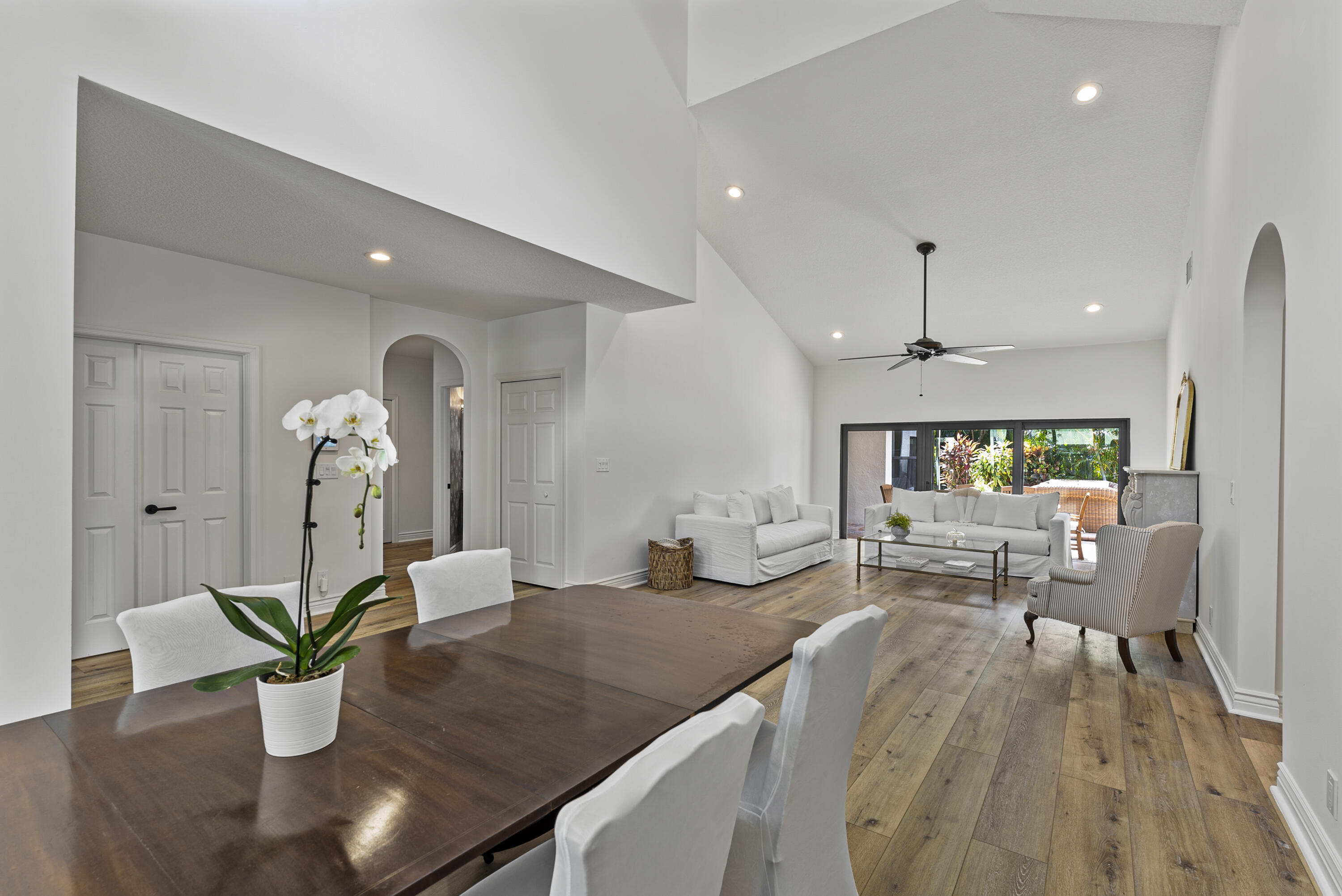 1925 Parkside Circle South Boca Raton, FL 33486 - Photo 8 of 61 a living room with kitchen island furniture and a chandelier