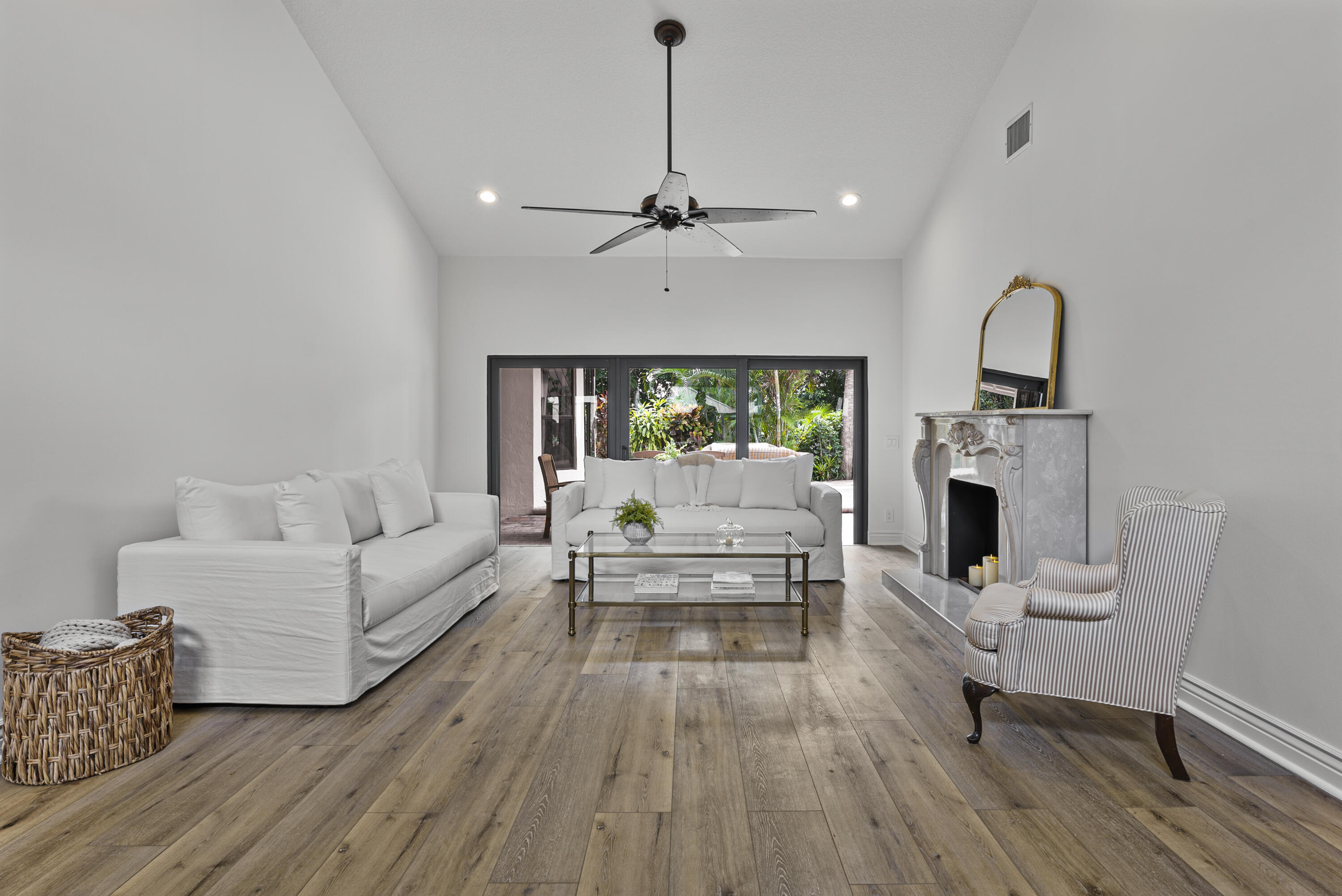 1925 Parkside Circle South Boca Raton, FL 33486 - Photo 9 of 61 a living room with furniture and a fireplace