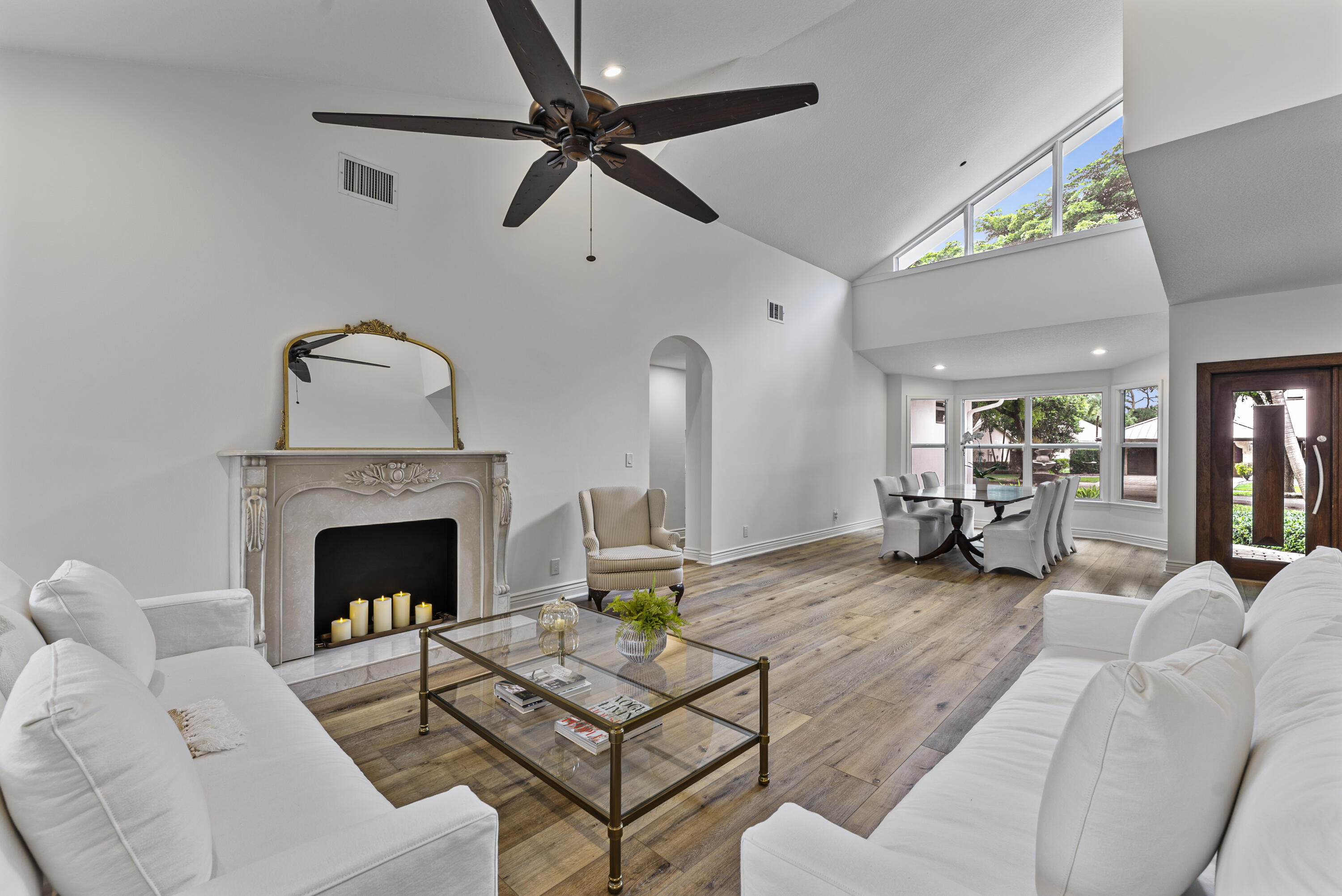 1925 Parkside Circle South Boca Raton, FL 33486 - Photo 10 of 61 a living room with furniture and a fireplace