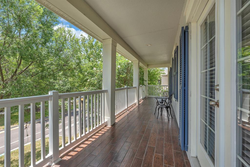 5310 Fishhawk Ridge Drive Lithia, FL 33547 - Photo 38 of 52 a view of balcony with wooden floor