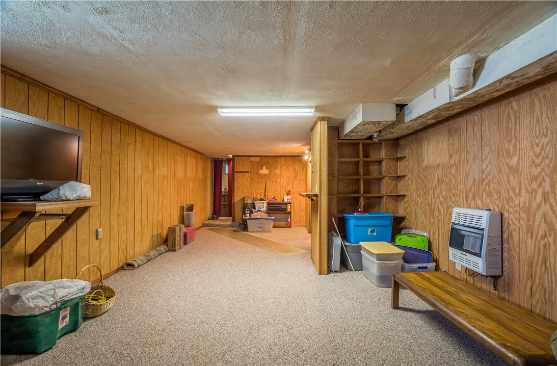 1319 Perry Road Cable, OH 43009 - Photo 28 of 44 This versatile basement offers ample space and built-in shelving for all your storage needs.