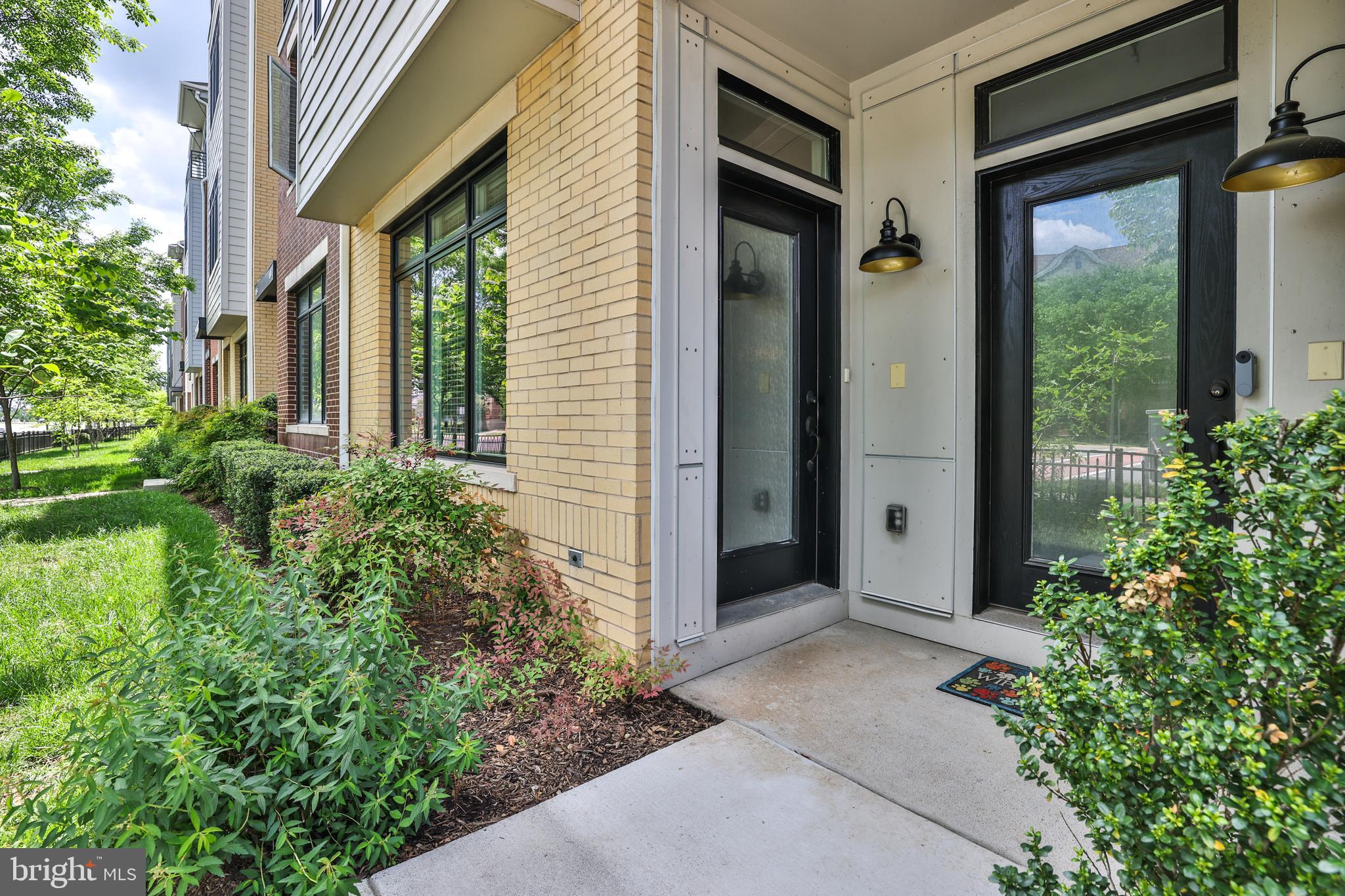 1102 Ribbon Limestone Terrace Southeast Leesburg, VA 20175 - Photo 7 of 51 a view of small house with potted plants