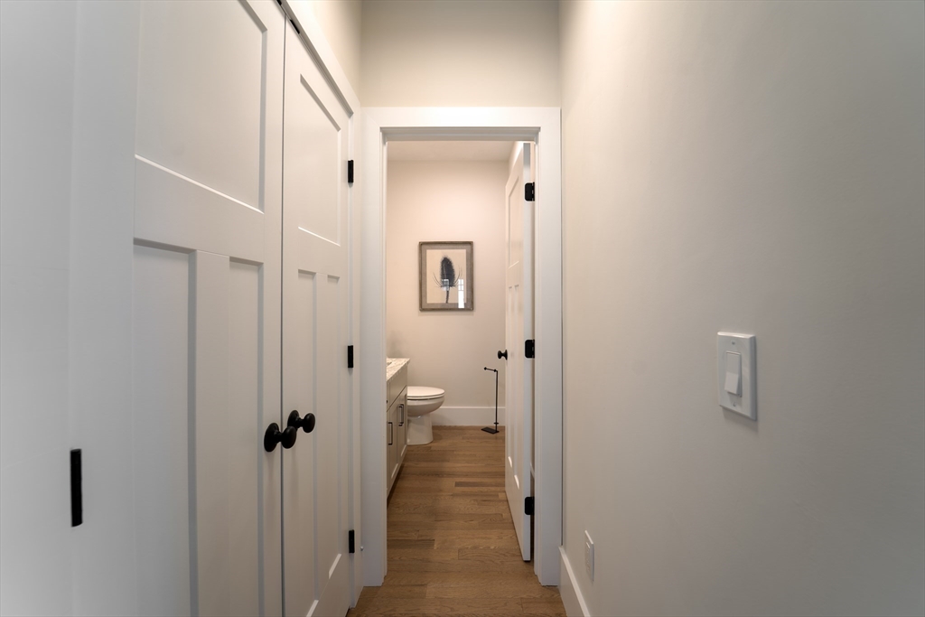 20 Metacomet Road, Unit 20 West Bridgewater, MA 02379 - Photo 15 of 30 a view of a bathroom from a hallway