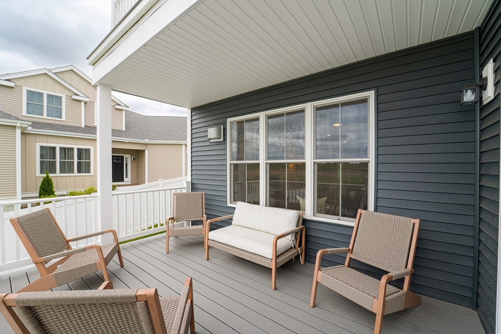 20 Metacomet Road, Unit 20 West Bridgewater, MA 02379 - Photo 27 of 30 a building outdoor space with patio furniture