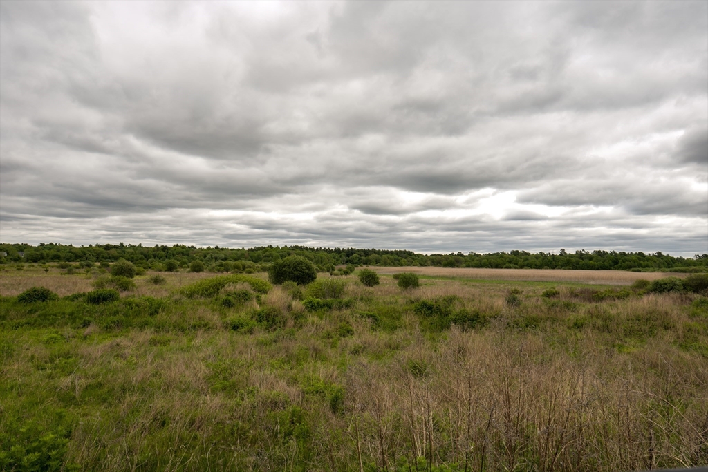 20 Metacomet Road, Unit 20 West Bridgewater, MA 02379 - Photo 30 of 30 a view of a lake with a city