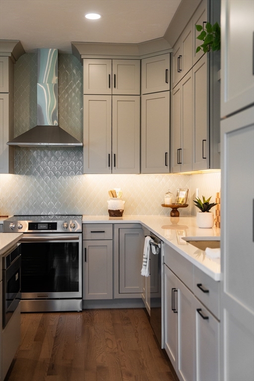 20 Metacomet Road, Unit 20 West Bridgewater, MA 02379 - Photo 7 of 30 a kitchen with stainless steel appliances granite countertop a stove and a sink