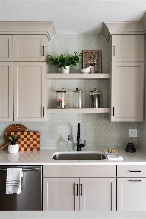 20 Metacomet Road, Unit 20 West Bridgewater, MA 02379 - Photo 8 of 30 a kitchen with cabinets and a stove top oven