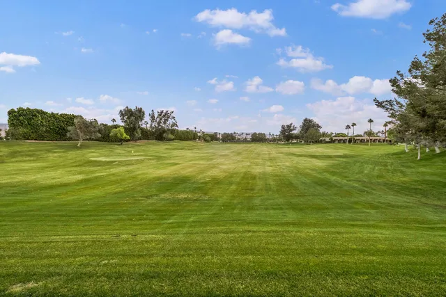 a view of a lake with a big yard