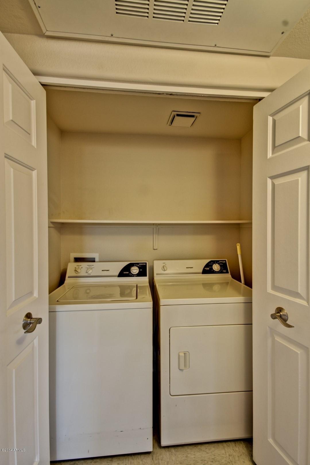1825 West Ray Road, Unit 2055 Chandler, AZ 85224 - Photo 16 of 28 a utility room with dryer and washer