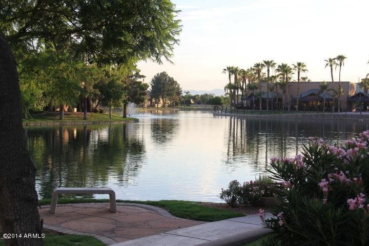 1825 West Ray Road, Unit 2055 Chandler, AZ 85224 - Photo 28 of 28 a lake view with a garden