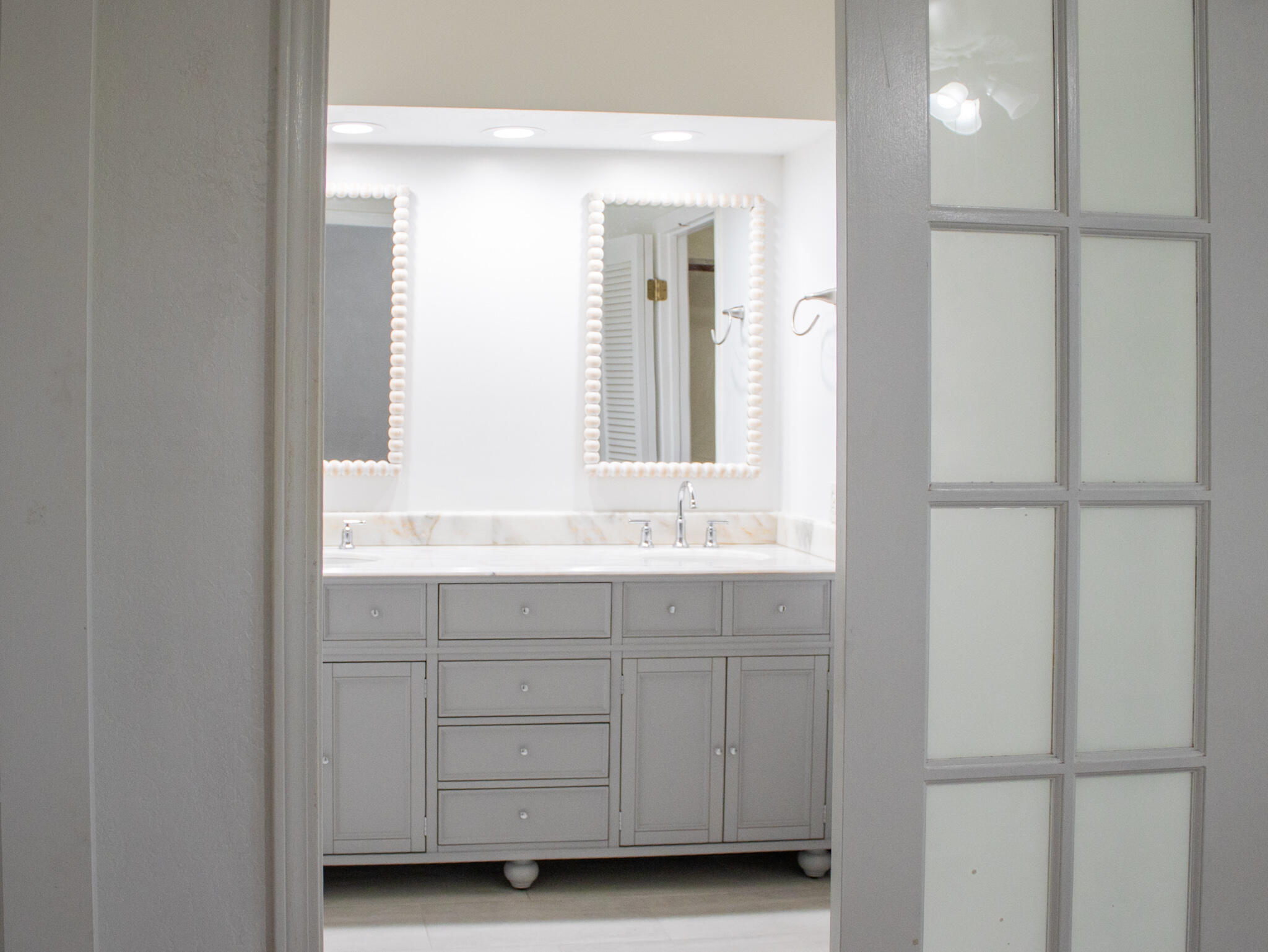 118 Baywind Drive Niceville, FL 32578 - Photo 11 of 27 a bathroom with a sink and a mirror