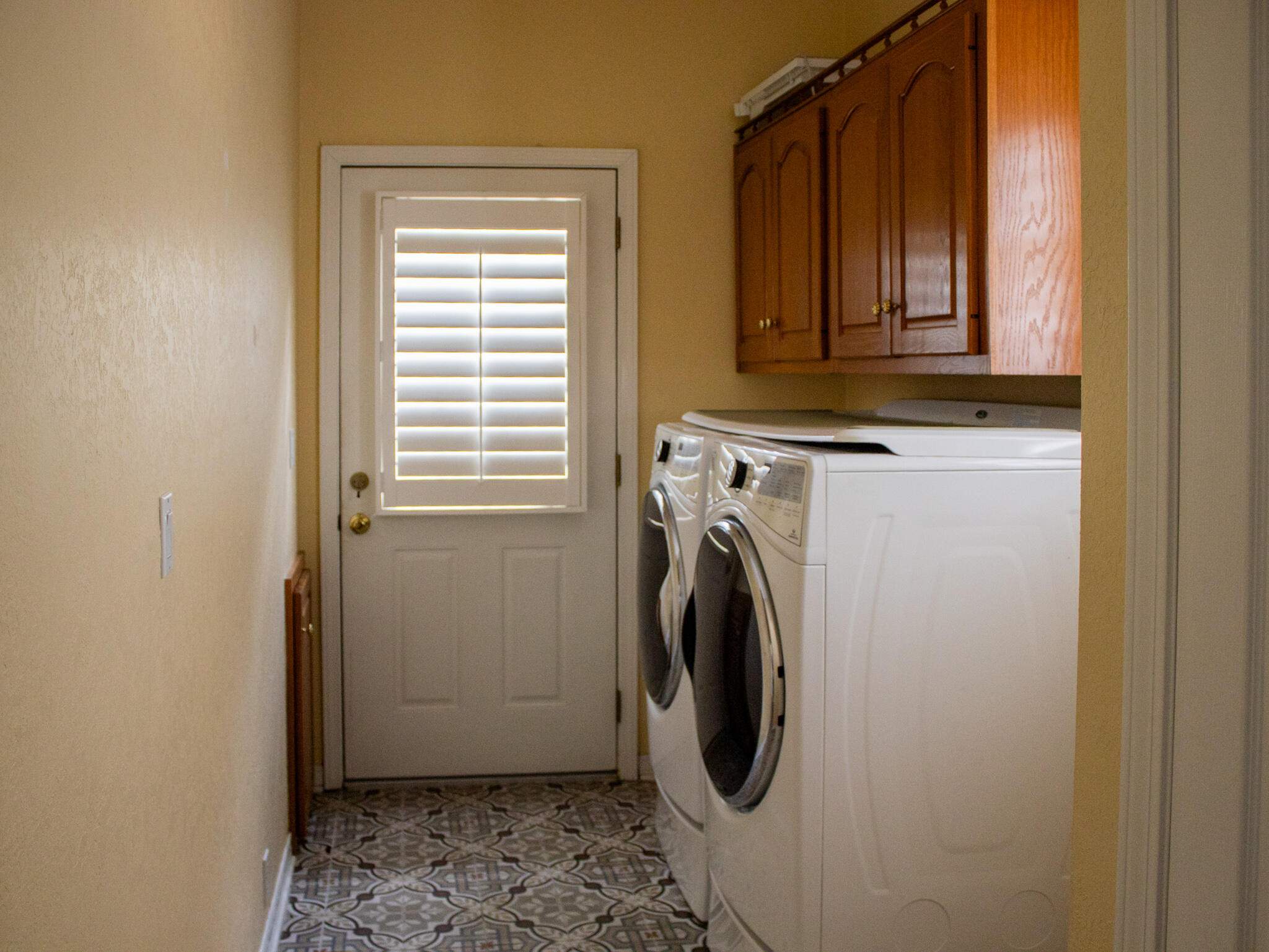 118 Baywind Drive Niceville, FL 32578 - Photo 22 of 27 a utility room with dryer and washer