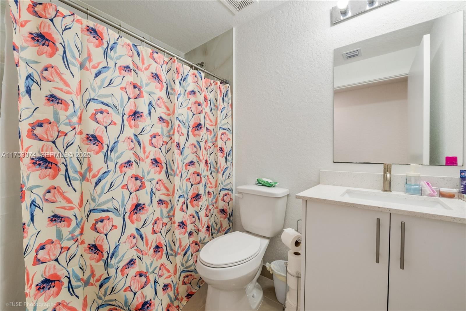 25616 Southwest 143rd Avenue Homestead, FL 33032 - Photo 6 of 12 a white toilet sitting next to a bathroom sink