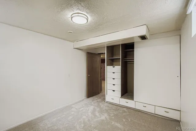 an empty room with closet