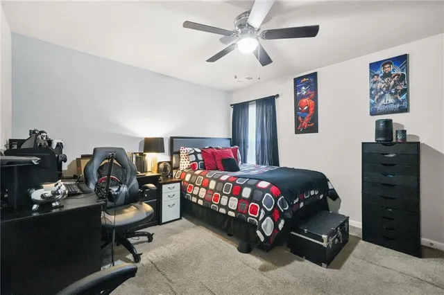 a bedroom with a bed and gym equipment