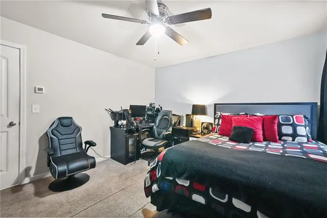 a view of a two chairs in the balcony