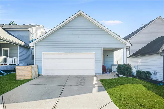 front view of a house and a yard